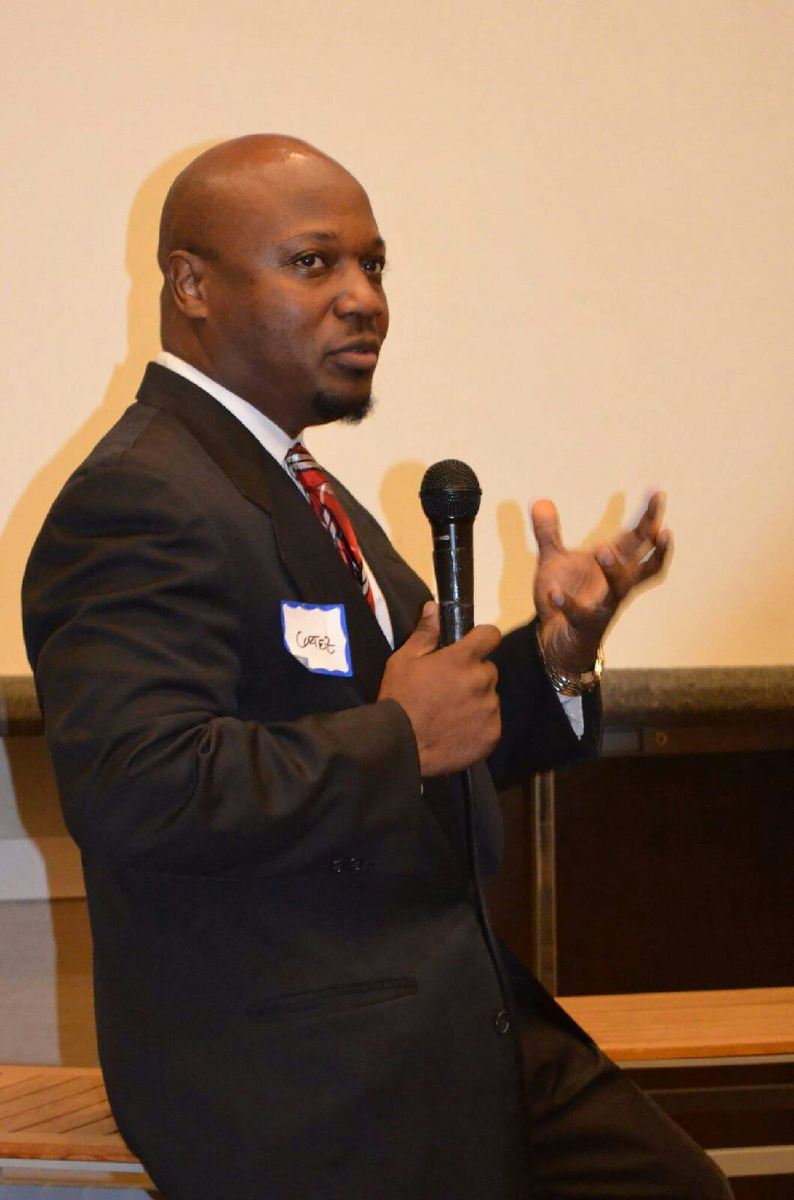 facebook_1425598178759 Dr. Cortez D. Sims speaking at an event
